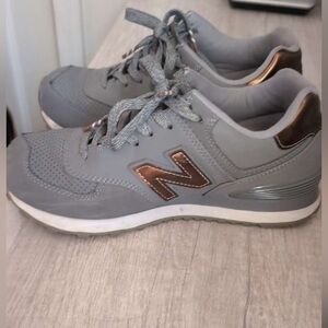 New Balance 574 Women’s Gray and Gold/Copper